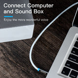 VENTION 3.5mm to 2RCA audio cable connecting a computer to a sound box for enhanced audio quality