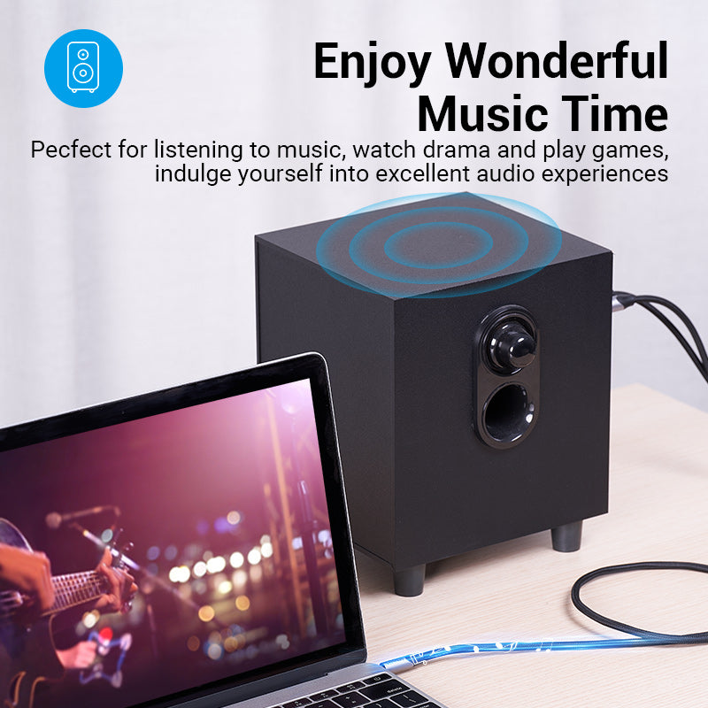 VENTION 3.5mm to Dual 6.5mm Audio Cable connected to a speaker for high-quality audio experience