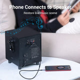VENTION 3.5mm to RCA adapter cable connecting a phone to a speaker for music playback