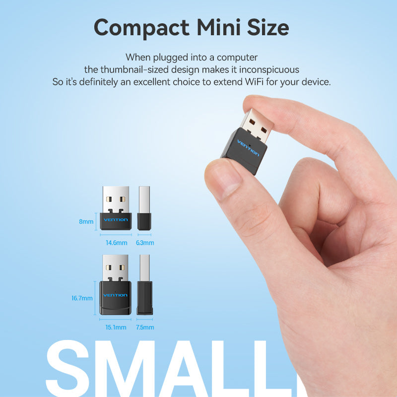 Vention AC600 Dual Band Wi-Fi Adapter compact mini size USB Wi-Fi extender held between fingers