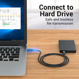 Vention USB Data Cable Connected to a Hard Drive for Safe and Lossless File Transmission
